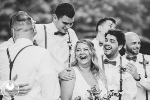 bride with groomsmen photos