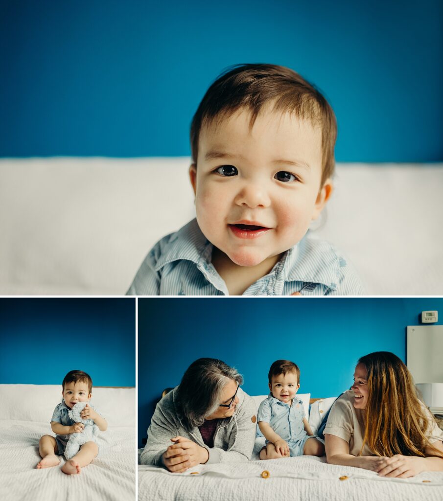 a collage of 3 images, all in a blue bedroom. the large picture shows a close-up of a smiling little boy. the bottom left image is the same little boy, taken from a bit farther away, as he's holding his light blue stuffed animal. The bottom right image is the same little boy, looking directly into the camera smiling, as his parents sit on either side of him looking at him smiling. 
