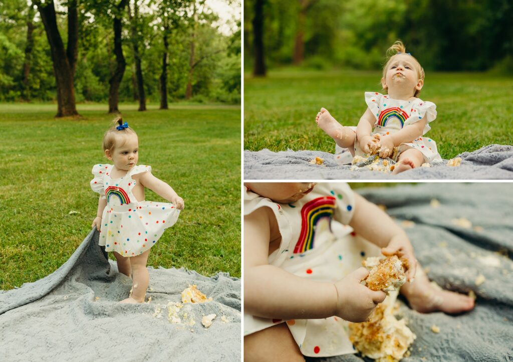 A cake smash taking place in the summer in a Philadelphia park. The baby girl is crumbling the cake and playing with it. 