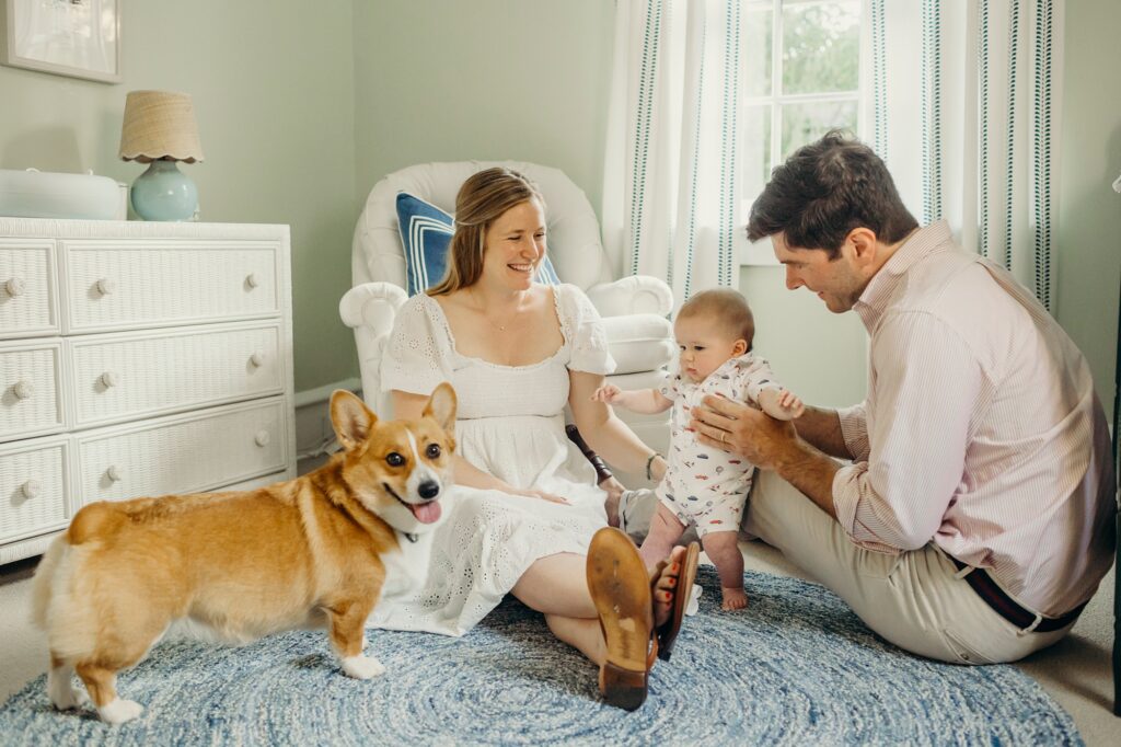 a family photoshoot in center city philadelphia that includes their pet corgi and 6-month old baby 