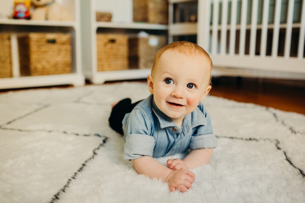 6 month old baby boy in his Fishtown home during an at-home winter lifestyle family photoshoot 