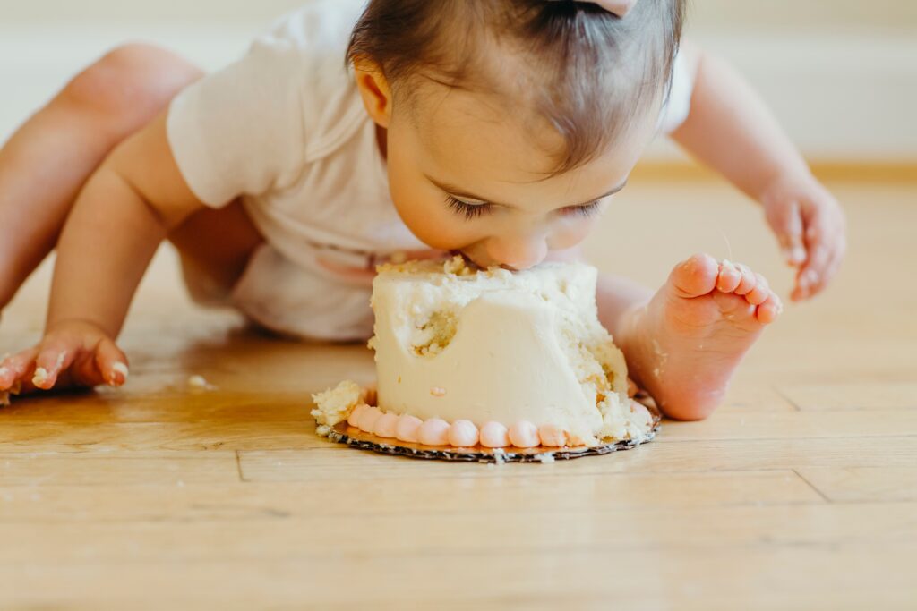 baby girl at her at home lifestyle cake smash in Philadelphia