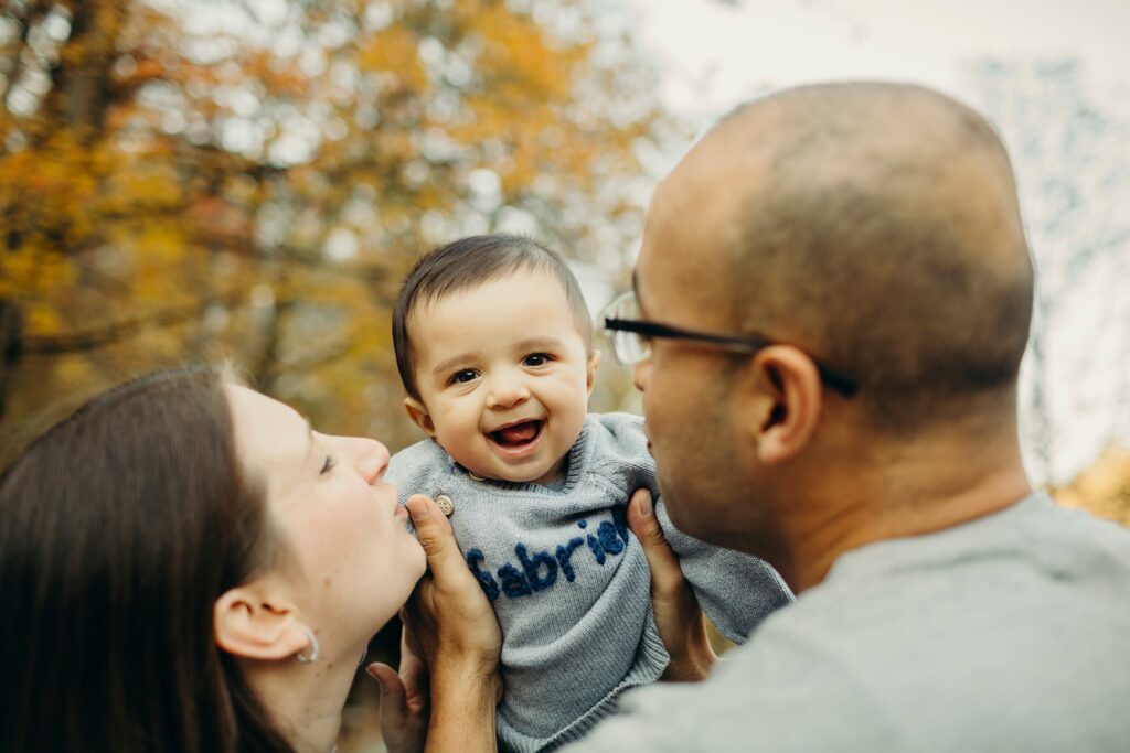 a family during a Fall photoshoot with Alexa Nahas Photography at Valley Forge 