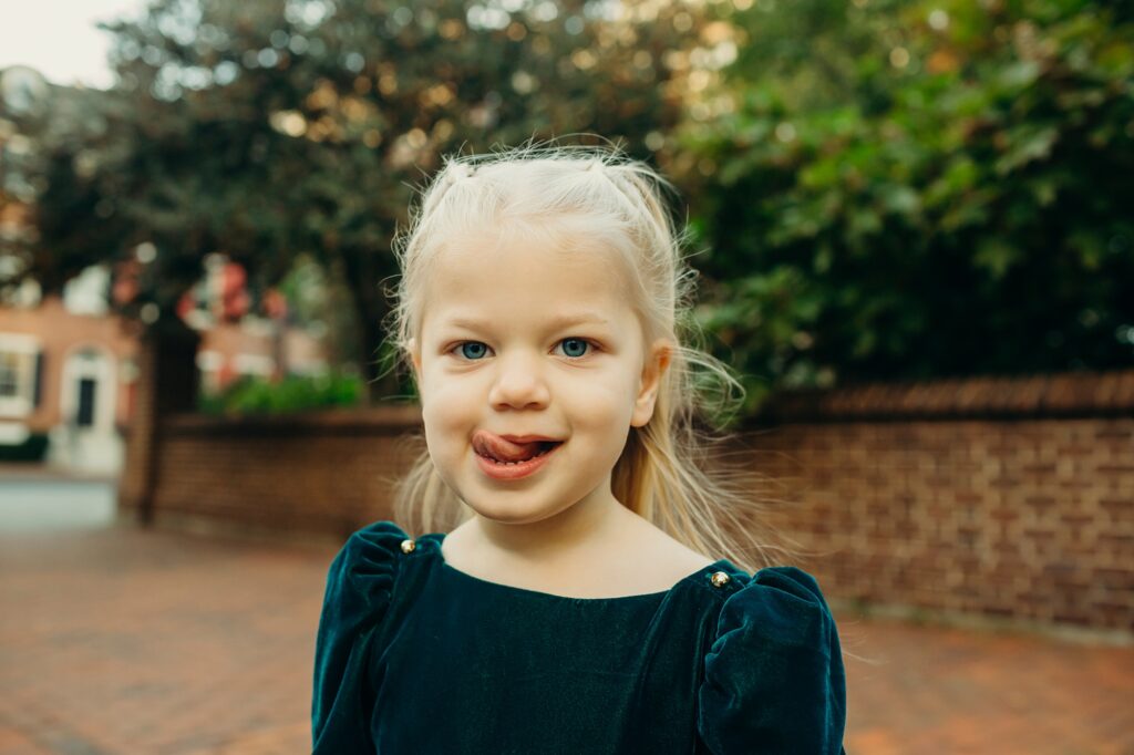 a little girl in Center City Philadelphia during her lifestyle family photo session 