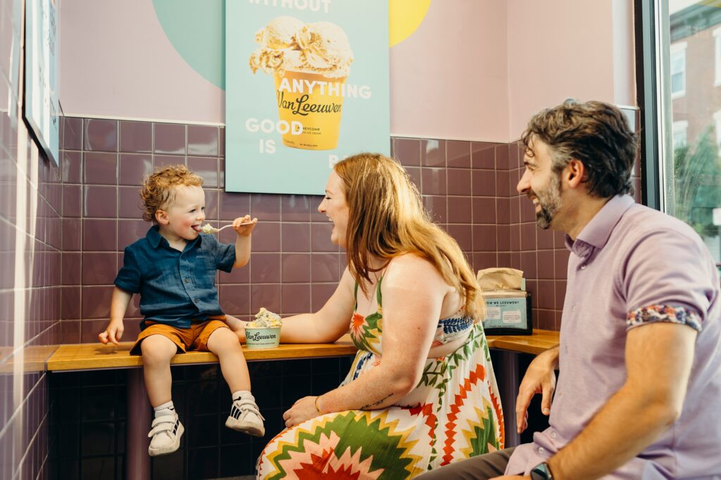 Philadelphia family eating ice cream at Van Leeuwen during the family photoshoot in the summer.