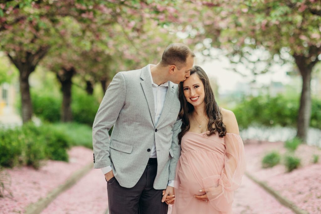 Cherry blossom maternity photos during Spring in Philadelphia.