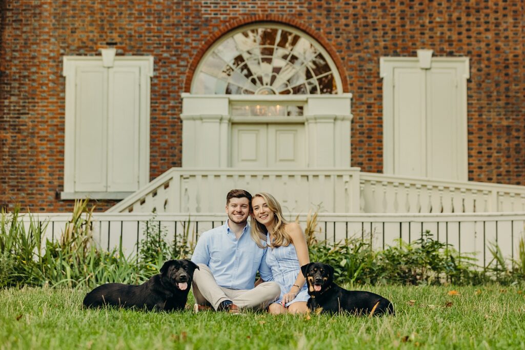a Center City Philadelphia couple with their two dogs during a summer pet session in Old City 