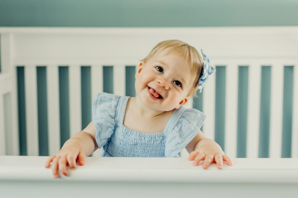 a portrait of a one-year-old girl during her family photo session in Cherry Hill, New Jersey 