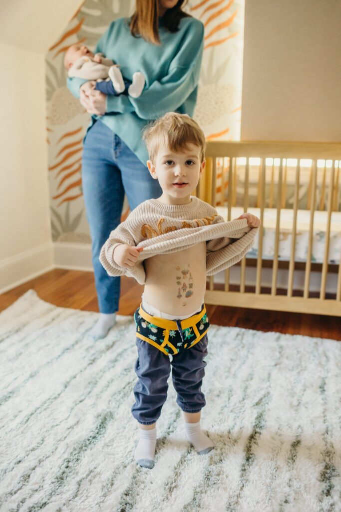 a funny toddler during his at home family photoshoot in Roxborough, Philadelphia, Pennsylvania. 