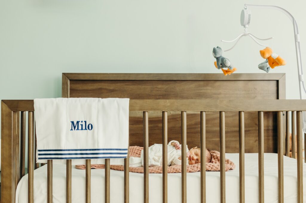 sleepy newborn baby boy in his South Philadelphia home. 