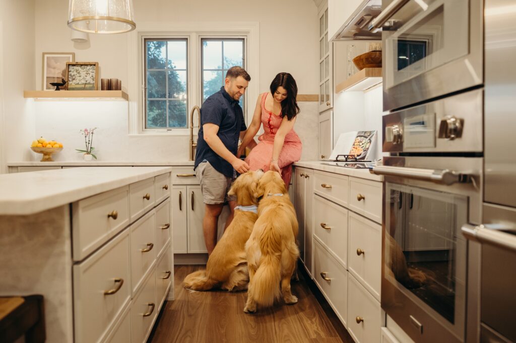 a Philadelphia couple with their two pet dogs during a lifestyle indoor pet session in Chestnut Hill 