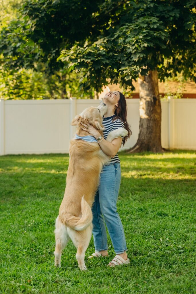 Philadelphia woman with her dog during a summer lifestyle pet session in Mt. Airy 