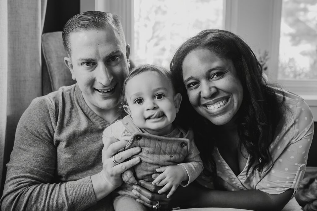 adorable close up photo of family of 3 during their at home, lifestyle family session in Philadelphia, Pennsylvania 